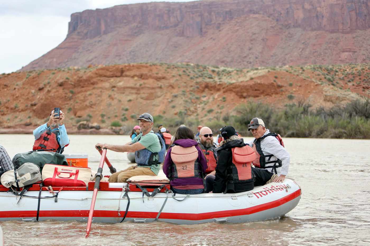 Tim Gaylord, Holiday River Expeditions director of operations, takes journalists and water experts down the Colorado River Moab Daily during a kickoff event for the Colorado River Collaborative in Grand County on Thursday, April 25, 2024. The kickoff event was sponsored by the Utah State University Janet Quinney Lawson Institute for Land, Water and Air and The Water Desk. (Kristin Murphy, Deseret News)